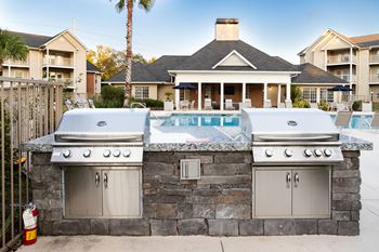 Lakeside Pool with Outdoor Kitchen and Fireplace